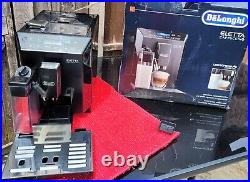 Coffee machine with milk frother and grinder