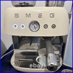Smeg EGF03CRUK Espresso Coffee Machine with Grinder and Gloss Cream Smeg EGF03CRUK Espresso Coffee Machine with Grinder and Gloss Cream